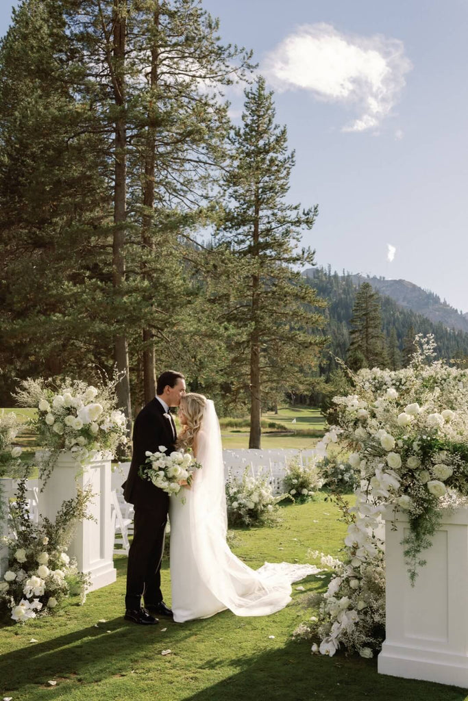 Newlyweds kissing at Everline Resort, captured by Kay Kroshus